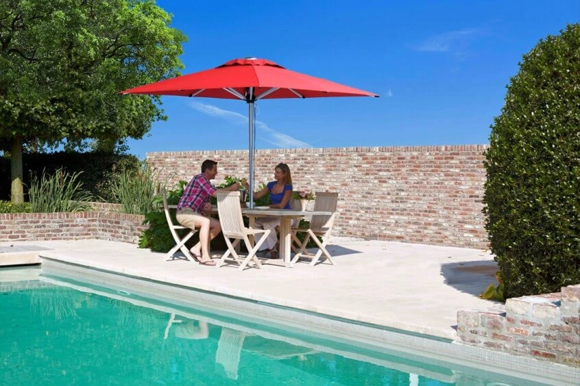 Family under shade umbrella
